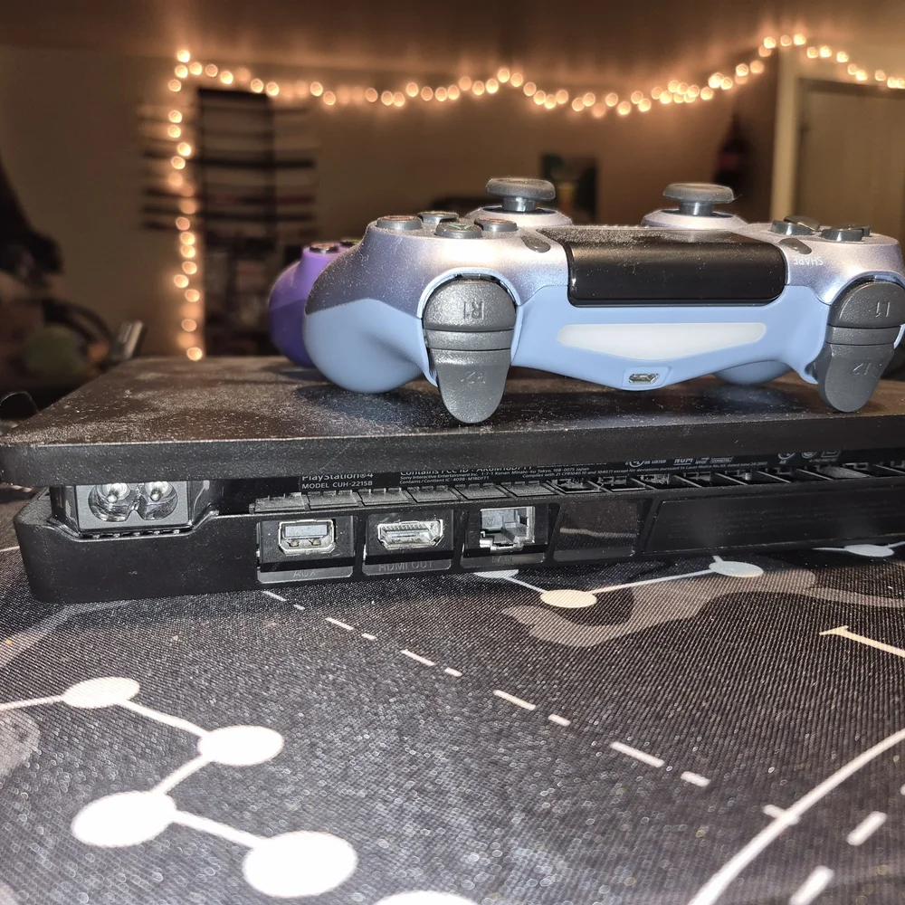 PS4 with Dual Purple and Blue Controllers And Cords